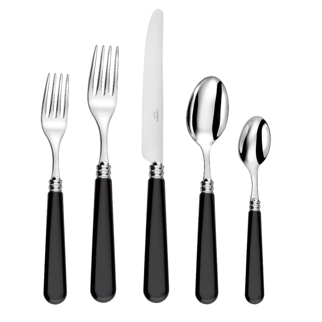 The Capdeco Altea Flatware 5 Piece Setting, crafted in France, features shiny stainless steel heads and black handles—includes two forks, one knife, and two spoons—displayed side by side on a white background.