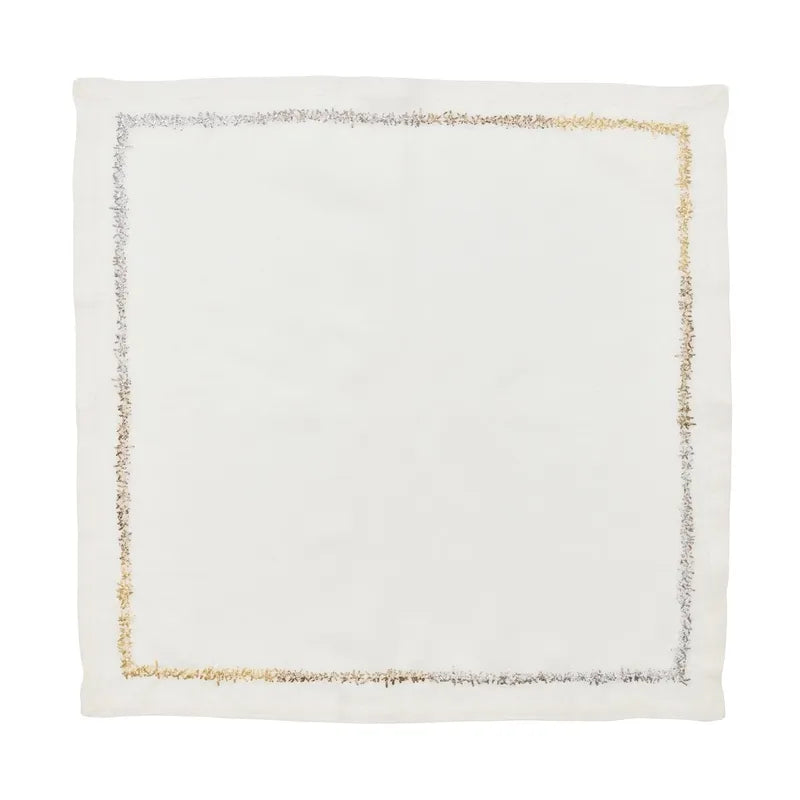 The Kim Seybert Aurelia Napkin Set of 4 in White Gold & Silver features white linen napkins with embroidered gold and silver borders, ideal for luxury table settings. Each square napkin is shown flat against a plain background.