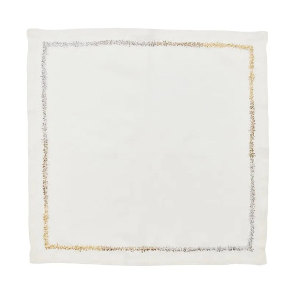 The Kim Seybert Aurelia Napkin Set of 4 in White Gold & Silver features white linen napkins with embroidered gold and silver borders, ideal for luxury table settings. Each square napkin is shown flat against a plain background.
