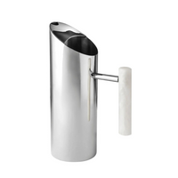 The Godinger Azure Pitcher - White features a sleek, modern polished stainless steel body with a tall cylindrical shape, spout, and contrasting white handle, displayed against a white background.