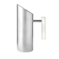 The Godinger Azure Pitcher - White features a sleek, cylindrical design in polished stainless steel with a glossy, reflective finish and a white handle, displayed against a plain white background.