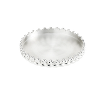 The Christofle Babylone Silver Plated Candle Holder features a smooth, round design with a raised beaded edge, making it an elegant accessory for candles or a touch of luxury home decor, shown on a plain white background.