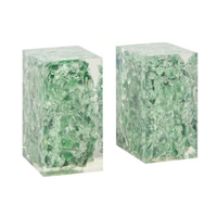 The Jessie Bookends Set by Made Goods features two clear rectangular resin bookends filled with irregular green glass-like fragments—ideal decorative shelf accessories.