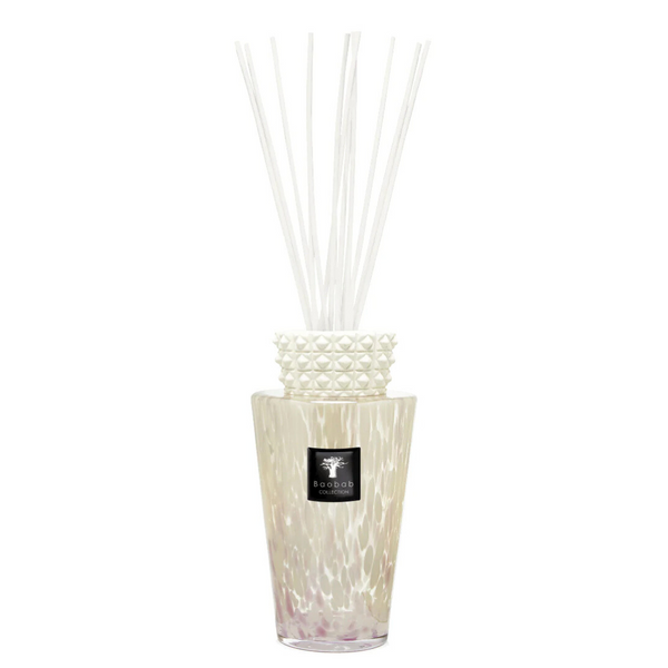 The Totem Pearls White Diffuser by Baobab features a decorative glass design with a textured white collar, filled with liquid and white reeds—an elegant touch to enhance your home fragrance experience.