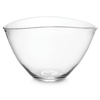 The Simon Pearce Barre Bowl is a clear glass bowl with smooth, slightly flared sides and a rounded base—an elegant piece of contemporary glassware inspired by handmade bowls.