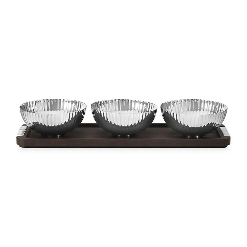 The Georg Jensen Bernadotte Triple Bowl Set features three clear, ribbed glass bowls arranged on a rectangular smoked oak tray, displayed from the front against a white background.