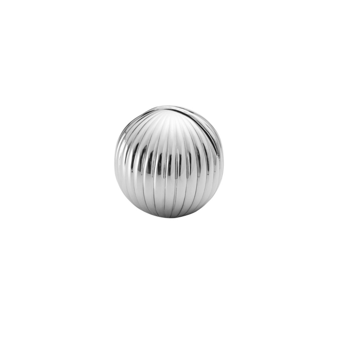 The Bernadotte Table Card Holders Set of 4 by Georg Jensen features shiny, metallic silver spheres with vertical grooves, inspired by classic Art Deco design, perfect for adding elegance to any table setting.