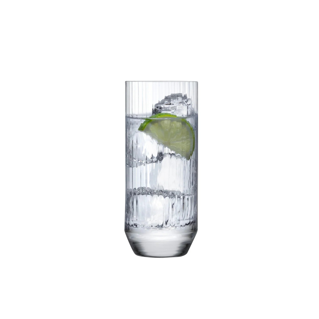 The Big Top Barware Set of 4 by Nude Glassware features tall, clear modern glasses with vertical ridges, shown here filled with ice, water, and a lime wedge.