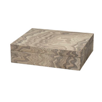 The Ravine Box - Grey by Jamie Young is a rectangular wooden box with a lid, showcasing an artisan-crafted, wavy marbled grain in light brown tones. This decorative storage piece is closed and set against a plain white background.