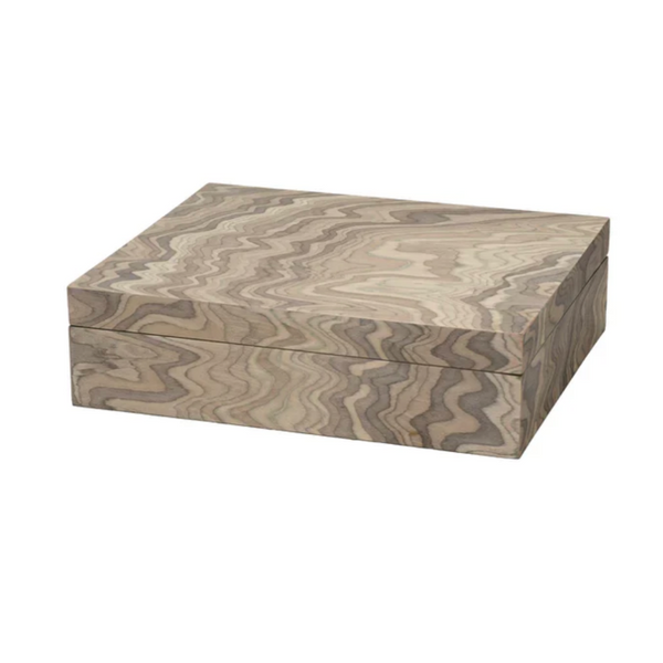 The Ravine Box - Grey by Jamie Young is a rectangular wooden box with a lid, showcasing an artisan-crafted, wavy marbled grain in light brown tones. This decorative storage piece is closed and set against a plain white background.