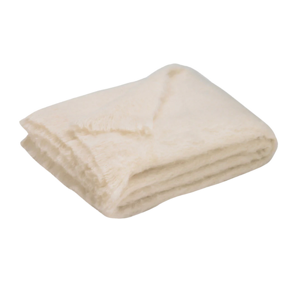 A folded, soft Brushed Cream Alpaca Throw by Lands Downunder with a fuzzy texture rests on a white background, offering luxurious warmth and comfort.