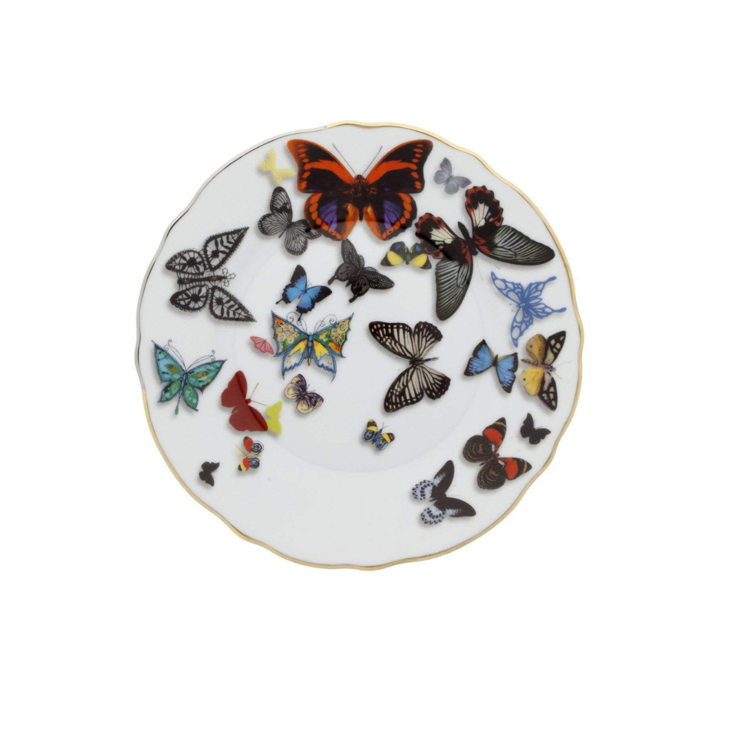 This Vista Alegre Butterfly Parade Dinnerware piece is a white porcelain plate with a gold rim, decorated with vibrant butterfly designs in assorted sizes—ideal for mixing and matching your dinnerware settings.