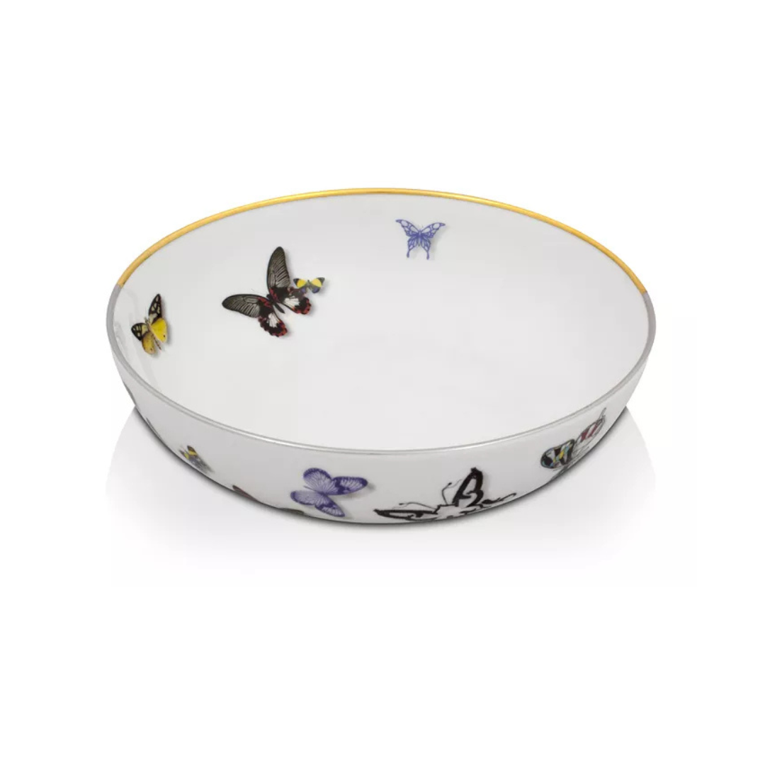 The Butterfly Parade Dinnerware by Vista Alegre is a white porcelain bowl with a thin gold rim, featuring vibrant butterfly illustrations inside and out—ideal for mixing and matching or adding luxury flair to your table.
