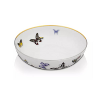 The Butterfly Parade Dinnerware by Vista Alegre is a white porcelain bowl with a thin gold rim, featuring vibrant butterfly illustrations inside and out—ideal for mixing and matching or adding luxury flair to your table.