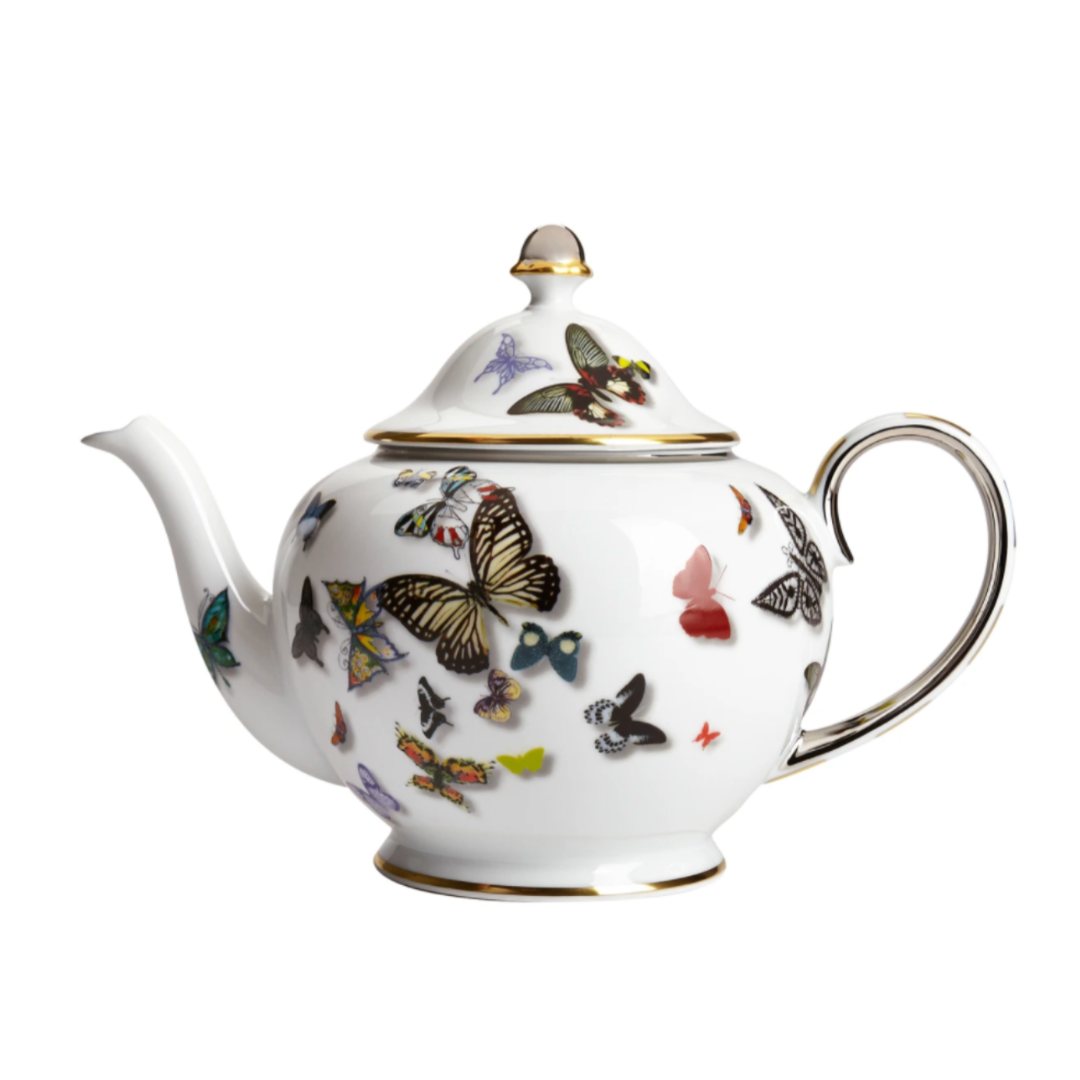 A white porcelain teapot with a gold-trimmed lid and handle, featuring colorful butterflies from the Vista Alegre Butterfly Parade Dinnerware—perfect for mixing and matching with other luxury tableware or this collection.