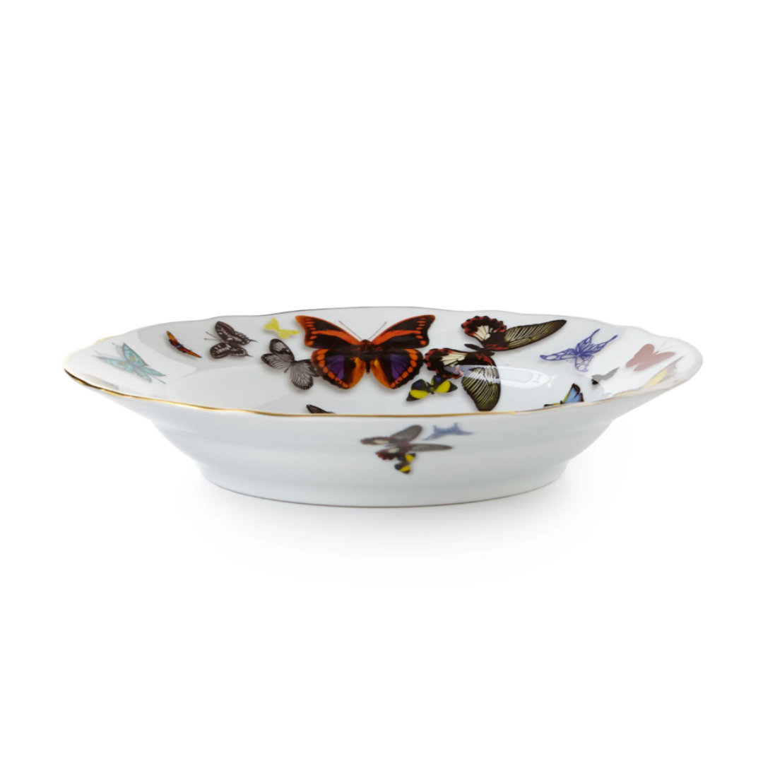 A white porcelain bowl with a scalloped edge, gold trim, and vibrant butterflies and moths—part of the elegant Vista Alegre Butterfly Parade Dinnerware for stylish mix-and-match table settings.