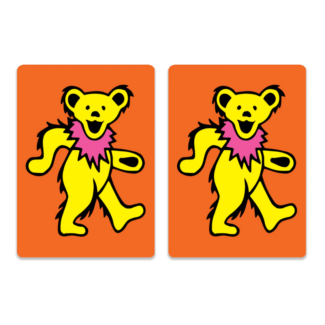 Two identical yellow dancing bears with pink collars, inspired by Grateful Dead artwork, appear mid-step on orange backgrounds—ideal for high-quality Canasta Card Sets from Canasta Sets.