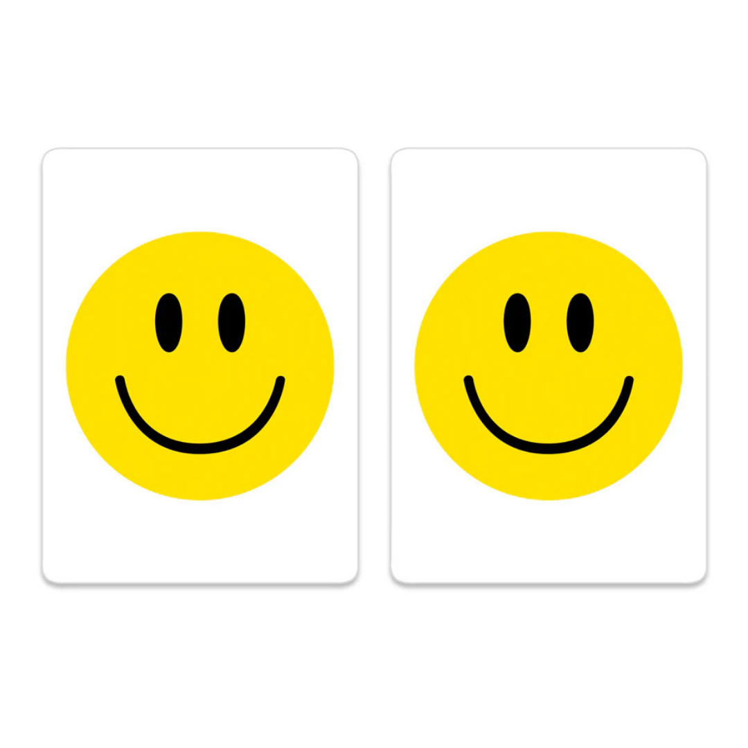 Two high-quality Canasta Sets cards, each featuring a centered yellow smiley face with black oval eyes and a curved black smile, perfect for adding fun to any card game or enhancing your Canasta Card Sets collection.