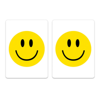 Two high-quality Canasta Sets cards, each featuring a centered yellow smiley face with black oval eyes and a curved black smile, perfect for adding fun to any card game or enhancing your Canasta Card Sets collection.