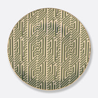 The Augusta Dinnerware by Bernardaud features an Art Deco-inspired round porcelain design with geometric patterns of green, beige, and black square dots in zigzag columns on a smooth light gray background.