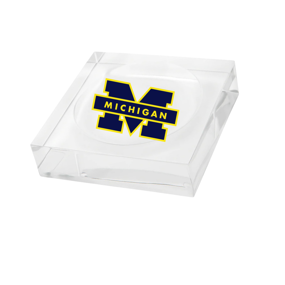 The Eye Candy College Sundry Jewelry/Catchall Dish features the University of Michigan’s block M logo in maize and blue with "MICHIGAN" across the center—a perfect gift for Wolverines and college students alike.