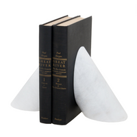 Two black hardcover copies of “Great River” by Paul Horgan are supported by Coronet Marble Bookends Pearl from Designs by Marble Crafter, their white, triangular shape adding a sleek accent against the plain white background.