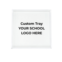 The Eye Candy College Acrylic Catchall Tray features a clear square design with "Custom Tray YOUR SCHOOL LOGO HERE" in bold black text at the center—an ideal minimalistic dorm room accessory for students.