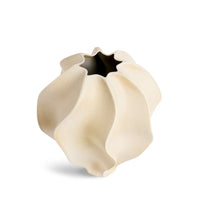 The Douro Vase Oat - Medium by L'Objet is a cream porcelain vase with a matte finish, organic wavy shape, undulating folds, and a scalloped opening—an elegant accent for any space.