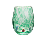 The Kim Seybert Gala Stemless Tumbler Set 4 features clear Murano glass tumblers adorned with a green swirling pattern and accented by small red and blue dots near the base, presented against a white background.