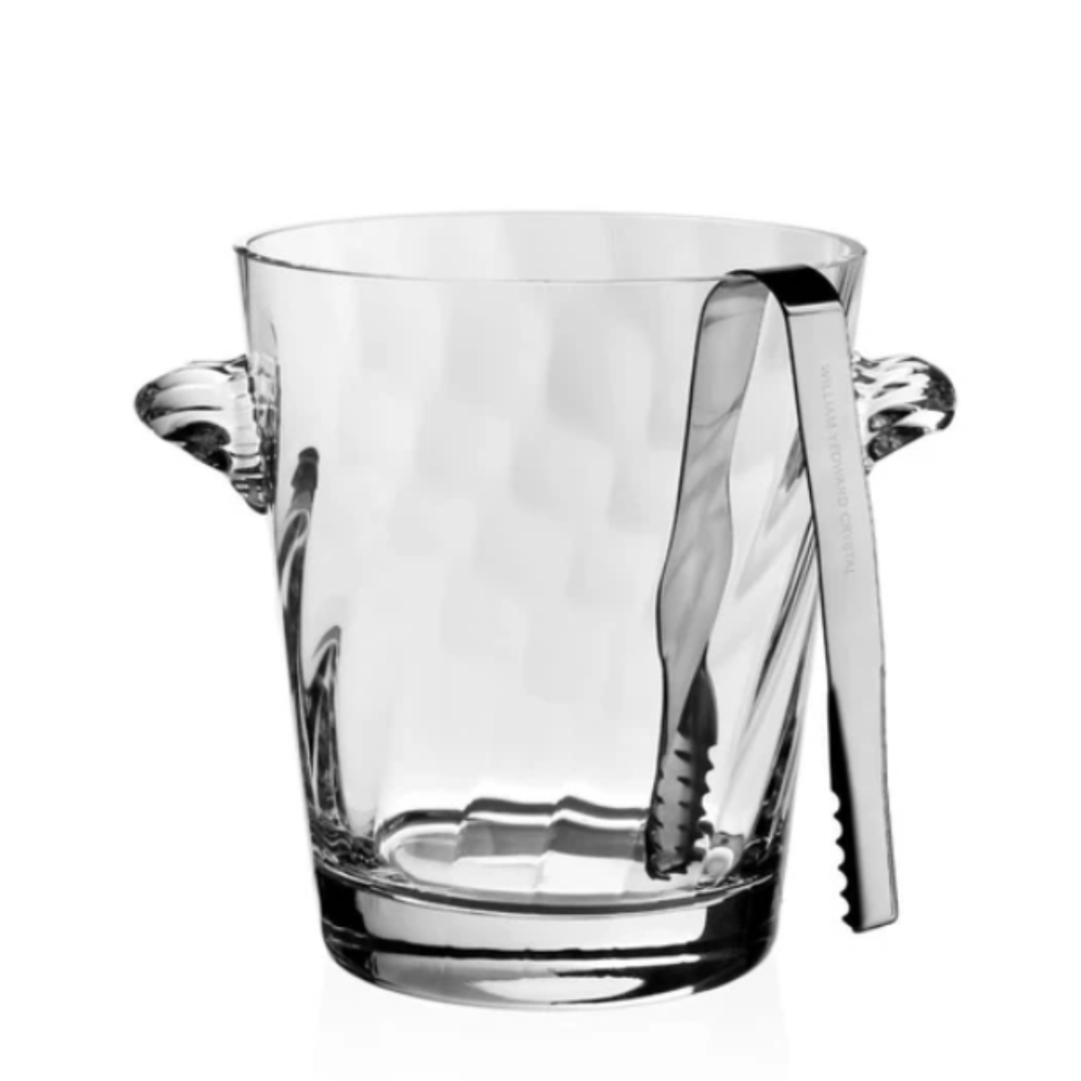 The William Yeoward Dakota Ice Bucket, crafted from clear glass with dual side handles and metal tongs on the rim, is a stylish addition to any wet bar or a perfect housewarming gift.