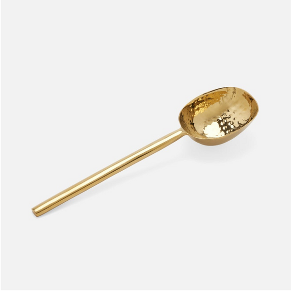 The Jupiter Deep Gold Serving Spoon by Blue Pheasant features a hammered gold-finished bowl and a smooth, long handle, shown resting on a white background.