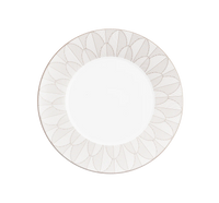 A round white plate from Christofle’s Malmaison Imperiale Porcelain Dinnerware Platinum collection, featuring a sophisticated geometric leaf pattern in platinum around the rim, is displayed against a plain white background. This elegant piece perfectly embodies Christofle’s signature blend of timeless refinement and contemporary design.