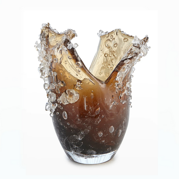 The Dual Wave Vessel by Global Views/Surya is a unique Polish handblown art glass vase featuring jagged, splintered edges and textured bubbles, with an amber-to-dark brown gradient resembling shattered ice.