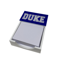The Eye Candy College Note Pad features a white holder with blank notes and a blue lid—a perfect note pad for college students and a thoughtful graduation gift.