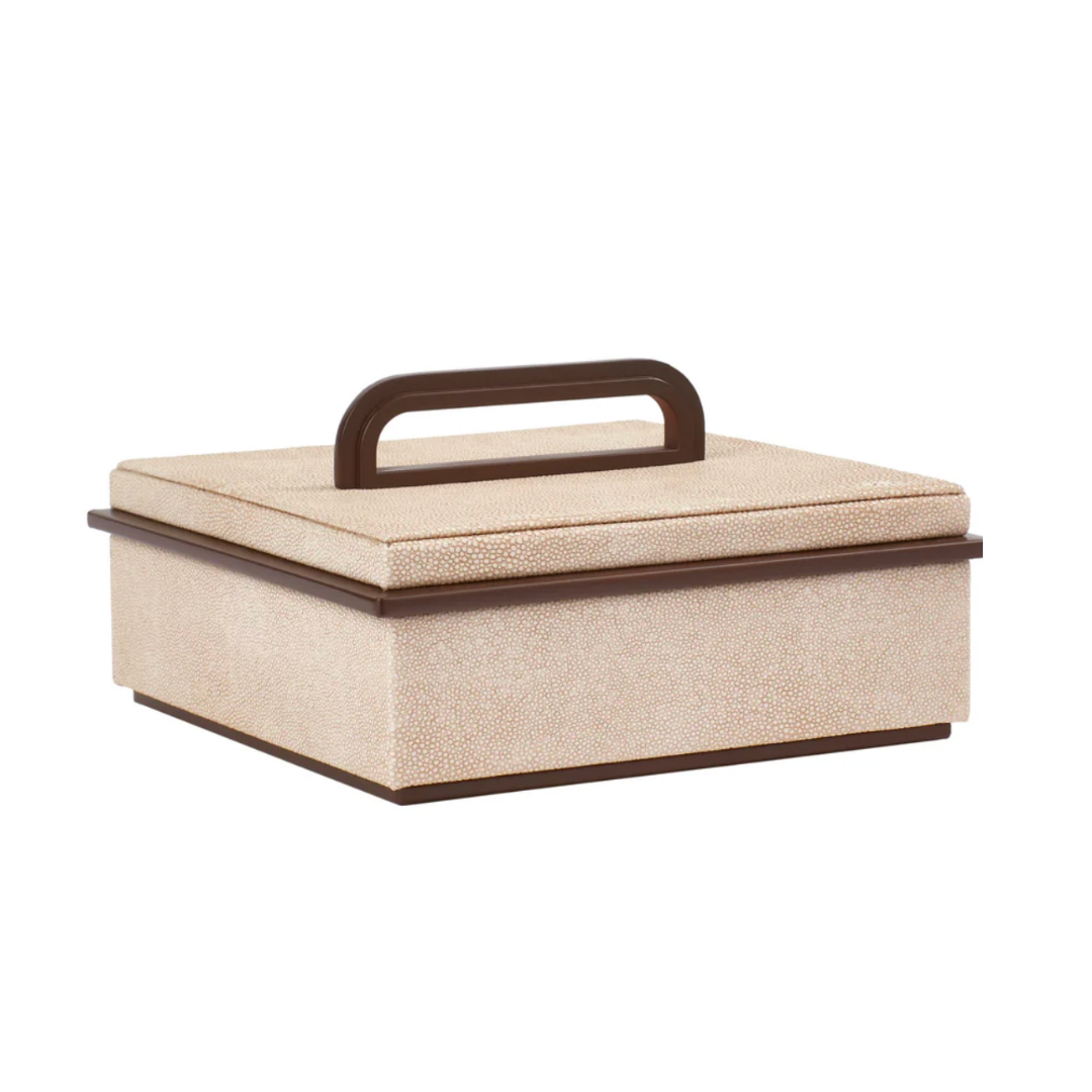 The Addison Ross Faux Shagreen Box Ecru features a cream-toned square design with a fitted lid, a dark brown rectangular handle on top, and matching trim along the edges.