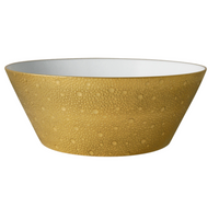 The Ecume Dinnerware Gold by Bernardaud features a wide, shallow bowl with a textured golden-yellow exterior and smooth white interior—an elegant contemporary piece perfect for elevating your dining experience.