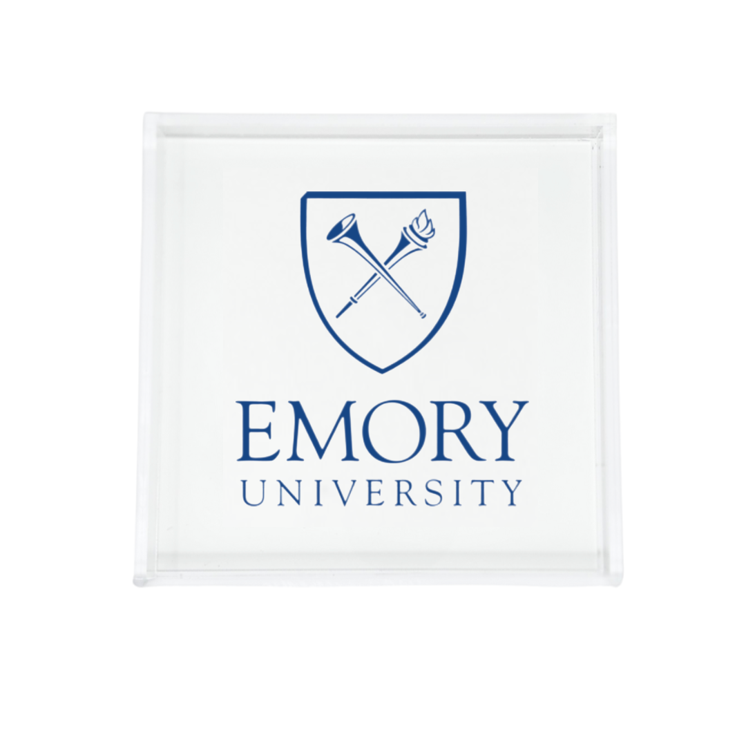 The Eye Candy College Acrylic Catchall Tray features the Emory University logo with a blue shield and crossed bugles—ideal for organizing essentials in your dorm or as a stylish school accessory.