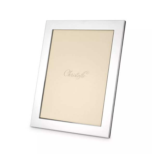 The Fidelio Christofle Silver Plated Frame (4x6) by Christofle is a sleek, rectangular photo frame with a beige insert featuring the Christofle script, showcasing the brand’s signature luxury craftsmanship.