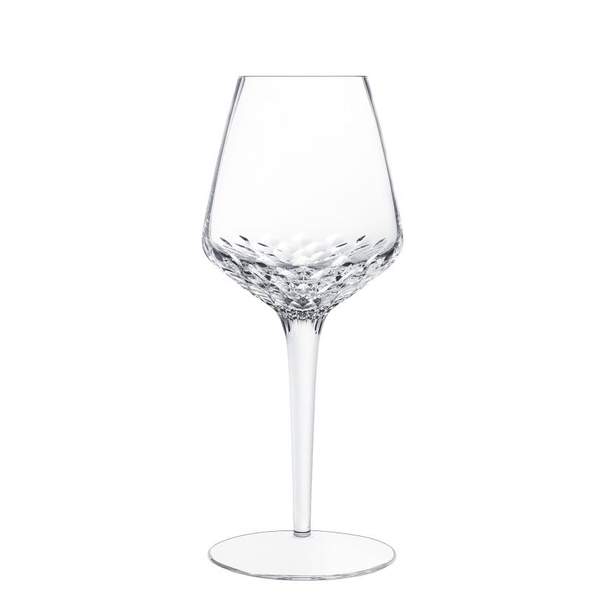 The Saint-Louis Folia Stemware is a clear, elegant crystal wine glass with a long stem and hand-cut facets on the lower bowl, shown on a plain white background.