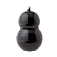 The Addison Ross Chubbie Bobbin Salt or Pepper Shaker features a glossy black, double-sphere design with a metal top knob, crafted from high gloss lacquer and rubber wood, resembling a snowman shape.
