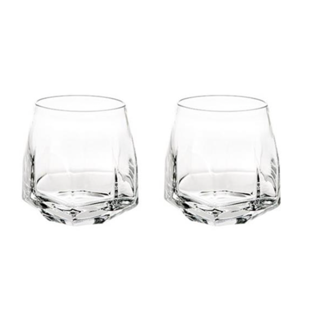 Two clear Gemstone Crystal DOF tumblers from Vista Alegre, featuring faceted bases and rounded sides, are made in Portugal and shown side by side on a white background.