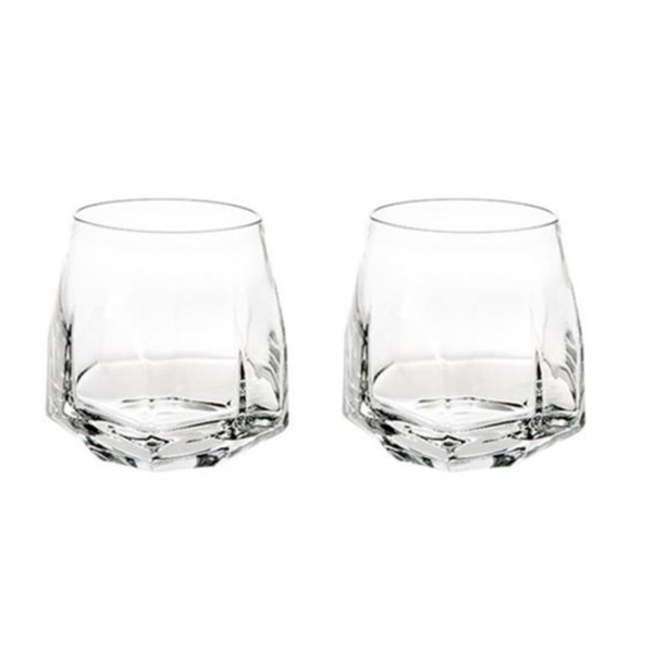 Two clear Gemstone Crystal DOF tumblers from Vista Alegre, featuring faceted bases and rounded sides, are made in Portugal and shown side by side on a white background.