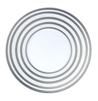 A modern round mirror from JL Coquet's Hemisphere Dinnerware Grey Stripes collection, inspired by Limoges porcelain and featuring four silver concentric rings for a symmetrical, elegant look.