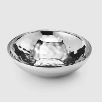 The Luna Serving Bowl 12" by Mary Jurek, crafted from shiny, hammered stainless steel with a round shape, is displayed on a plain light gray background.