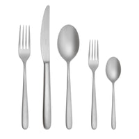 The Sambonet Hannah Antico Flatware 5 Piece Setting features a dinner fork, dinner knife, soup spoon, salad fork, and teaspoon with simple handles, arranged in a row on a white background.