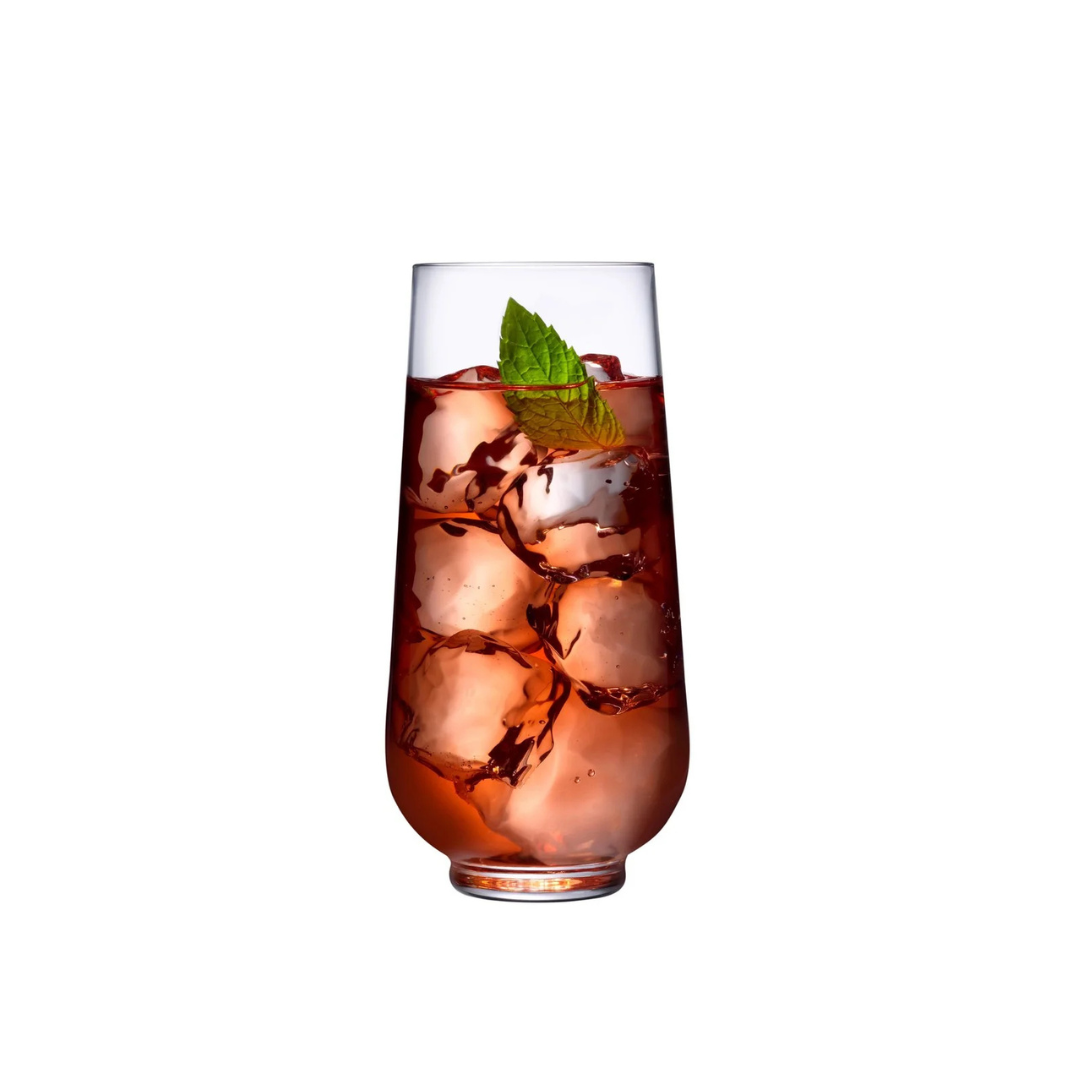 A Hepburn Glass from the Nude Glassware Hepburn Glass Set of 4, made of lead-free crystal, holds a reddish-brown iced drink with fresh mint garnish, standing out against a plain white background.