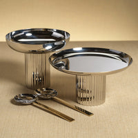 Two Polished Nickel Cake Stand pedestal stands and two matching spoons.