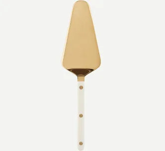 The Sabre Bistro Pearly Gold Tart Server features a gold-colored triangular blade and a white acrylic handle with three gold rivets, displayed on a plain white background.