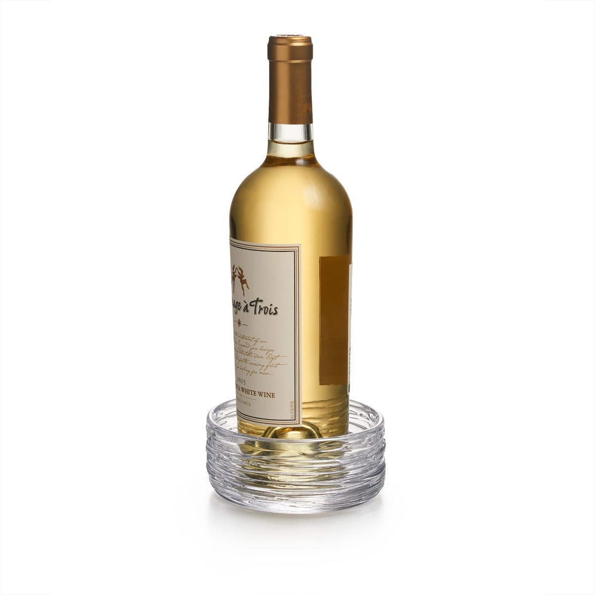 A bottle of white wine stands upright inside the Simon Pearce Echo Lake Wine Coaster, displayed on a white background.