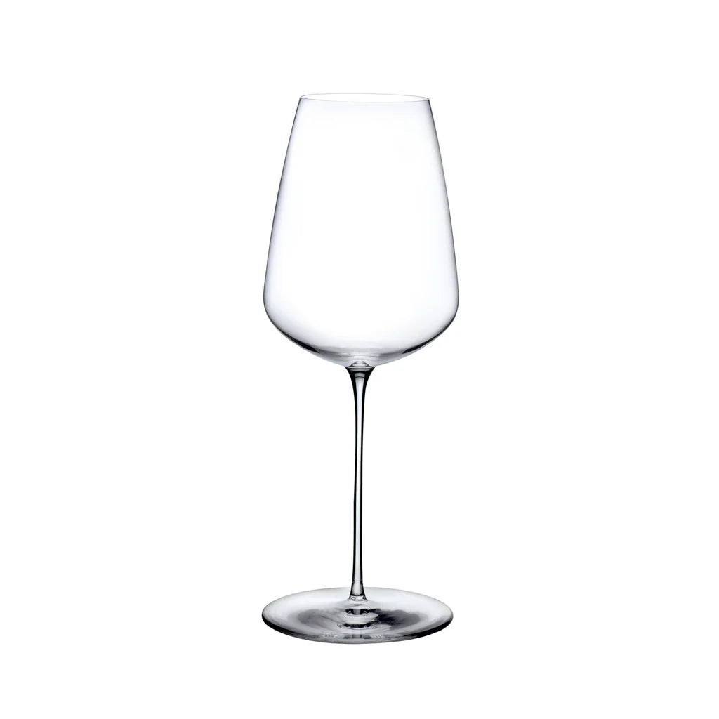 The Nude Glassware Stem Zero Delicate White Wine Glass, featuring a long stem and wide bowl, is photographed against a plain white background, highlighting its elegant design.